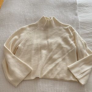 Cream oversized turtleneck sweater